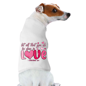 A dog wearing the "Valentine's Day Funny Shirt: Let All You Do" white shirt.